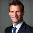 Professional headshot of Mark Thomson